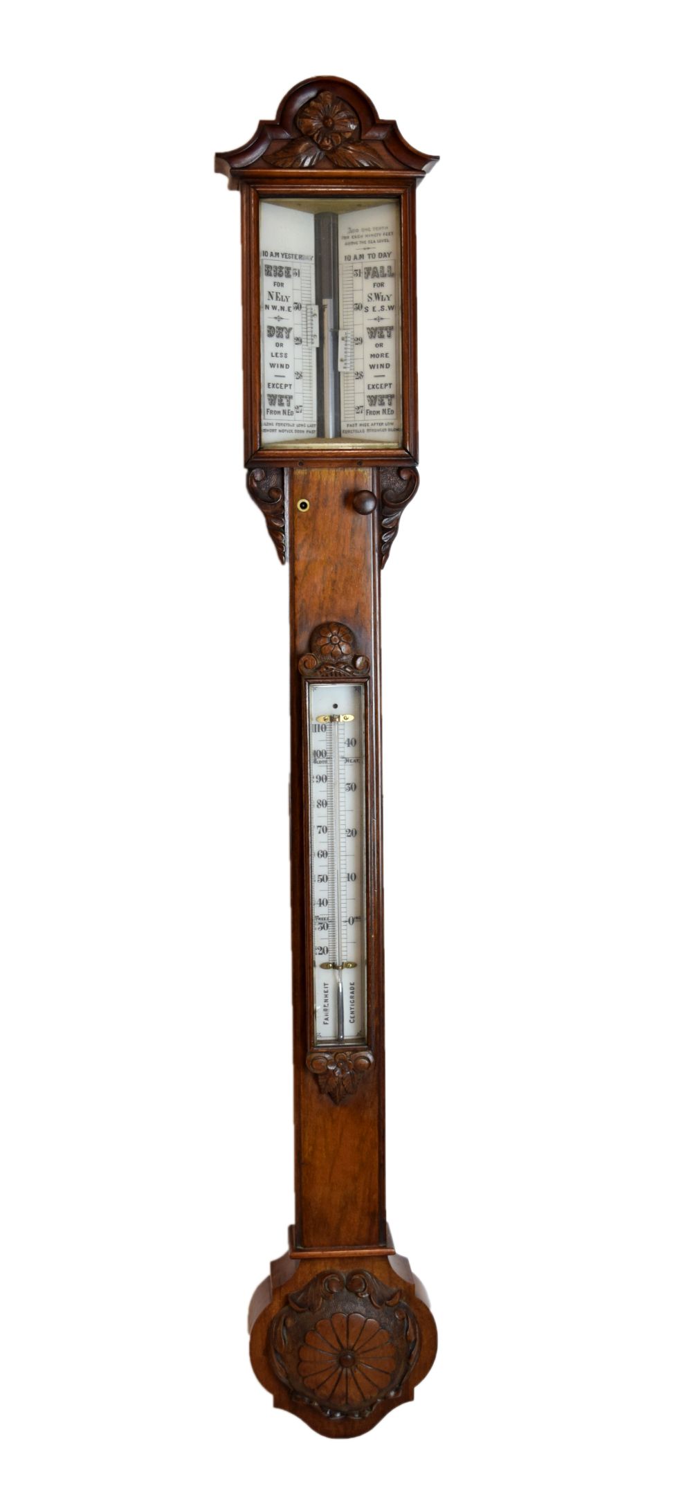 Late Victorian carved walnut stick barometer, anonymous, the white ceramic scale printed for 10am