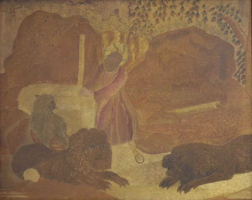 Early 19th Century silk work picture depicting Daniel in the Lion's Den, 46cm x 56cm, in gilt slip