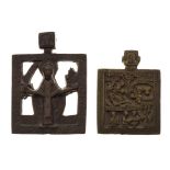 Two Russian Orthodox bronze pendant icons, the larger depicting St. Nicholas holding sword and