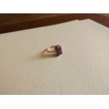 9CT GOLD RING RED STONE MOUNTED ON A SILVER SHANK SIZE K 2-1 gms EST [£20- £40]