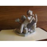 LLADRO FIGURE OF A BOY PLAYING A FLUTE [£25- £50]