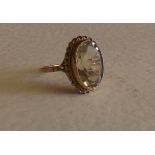9 CT GOLD RING WITH AN OVAL CITRINE STONE SIZE O 3.2 GMS EST [£40-£ 60]