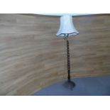 STAINED BEECH STANDARD LAMP SUPPORTED ON A BARLEY TWIST COLUMN EST [£20- £40]