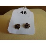 PAIR OF EARRINGS RUBY/GARNET CIRCULAR STAR SETTING EST [£20-£40]