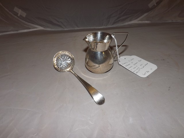 SMALL SILVER SIFTER SPOON & CREAM SILVER JUG OF SMALL PROPORTIONS EST [£20- £40]