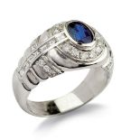 18kt white gold ring with oval sapphire and diamonds weight 7,8 gr.