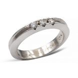 18kt white gold and three diamonds ring weight 6,6 gr.