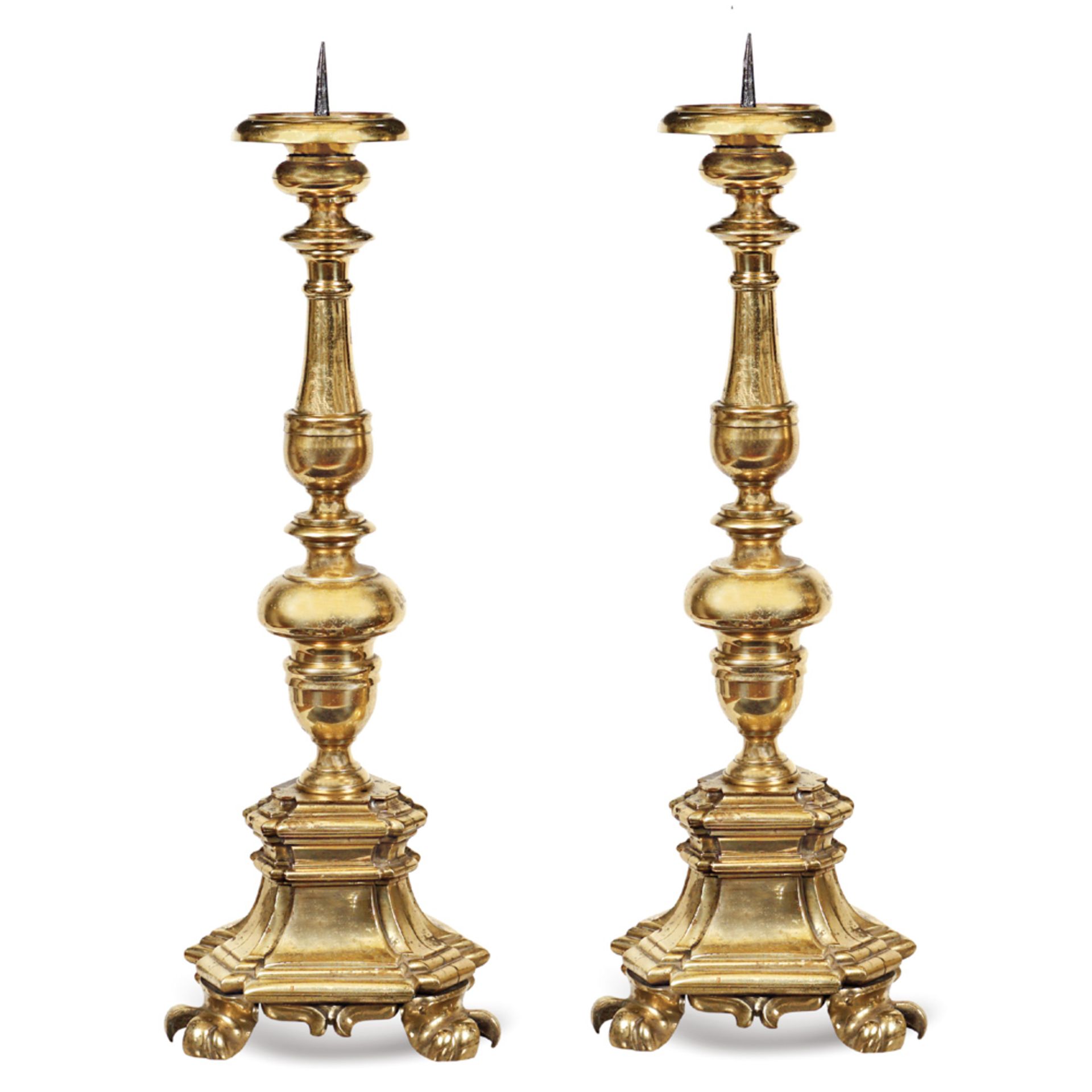 A pair of gilt and turned bronze torches 20th century h. 93 cm.