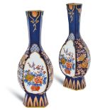 Pair of Imari style porcelain vases 20th century h. 37 cm.