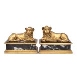 Pair of gilt bronze and marble lions France, 19th-20th century 15x21x10 cm.