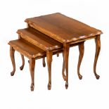 Three walnut tables Italy, 20th century 40x60x35 cm.