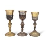 Group of silver and metal eucharistic chalices (3) 19th-20th century h. 24,5 cm. (maximum)