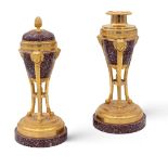 Pair of red porphyry and gilt bronze cassolettes France, 19th century h. 24 cm.