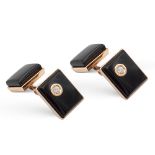 18kt rose gold, black onyx and two diamond cuff links weight 8,2 gr.