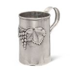 Silver mug Italy, 20th century h. 12 cm. plain body decorated with bunch of grapes and vine