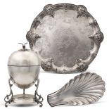 Group of metal objects (3) 20th century h. 22 - d. 33 cm. comprising: a salver, an egg holder and