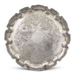 Silver salver Italy, 20th century 3x35 cm. body decorated with vegetal and floral motifs, resting on