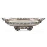 Two handled silver centerpiece Italy, 20th century 9x38x18 cm oval body chiseled with vegetal and