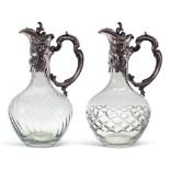 Pair of blown glass and silver plated ,metal jugs France, 20th century h.26 cm. with silver metal