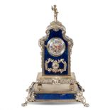 Silver and lapis lazuli table clock Vienna, 19th century 18x12x8 cm. chiseled structure with vegetal