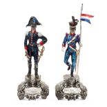 Pair of silver and polychrome enamel soldiers Italy, 20th century h. 17 e 15 cm. representing a