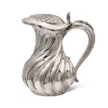 Silver jug Italy, 20th century h. 21,5 cm. torchon body and volute handle, weight 750 gr.