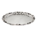 Oval silver tray Italy, 20th century 45x34,5 cm. decorated with floral motifs in relief, weight 1736
