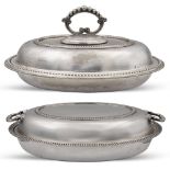 Two silver plated metal vegetable dishes different manufactures 31x20x14 cm. (maximum) oval bodies