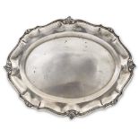 Oval silver tray Italy, 20th century 42,5x33 cm. plain body with shaped profile decorated with