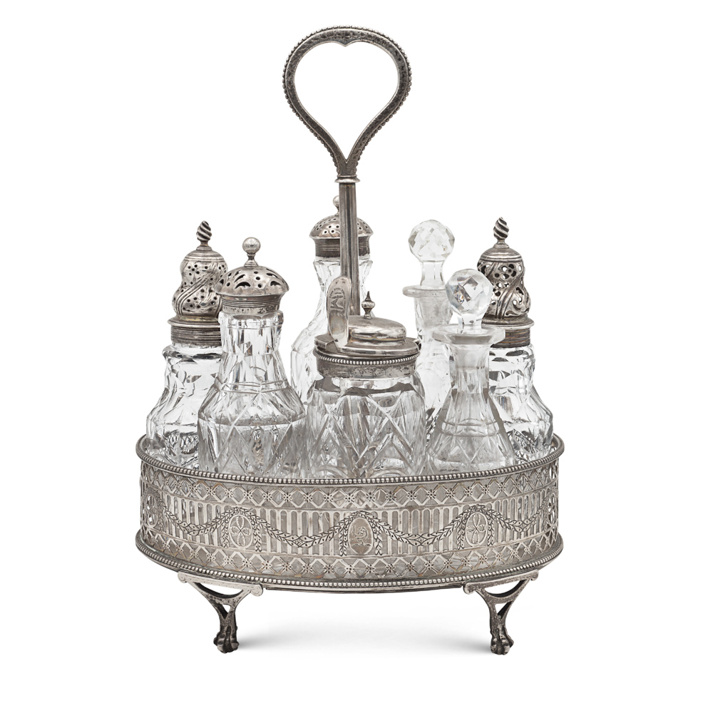 Silver cruet London, 1779 29x20x15 cm. marks of Robert Hennell, chiseled body with vegetal and