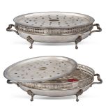 Pair of silvered metal food warmers 20th century 10x36x22,5 cm. oval body with two handles resting