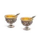 Pair of silver and vermeil salt cellars Italy, 20th century 7,5x8 cm. circular body decorated with