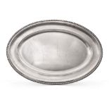 Oval silver tray Italy, 20th century 49,5x34,5 cm. plain body with knurled profile, weight 1288 gr.