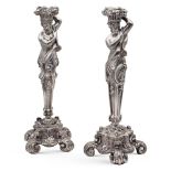 Pair of silver candlesticks Italy, 20th century h. 38 cm. marks of Delmar, Naples, chiseled bodies