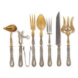 Silver serving flatware group (8) France, 19th century 5x41x38 cm. chiseled with vegetal motifs, a