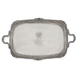Two handled silver tray London, 1884 40x68 cm. marks of William Hutton, plain body with chiseled