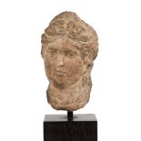 Stone Head of a Goddess with Diadem