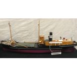 A large hand built wooden model of a Tramp Cargo Steamer. Approx 130cms.