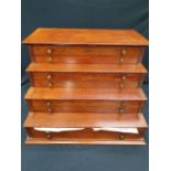 Stepped mahogany specimen chest.