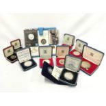 Collection of proof silver coins and others.