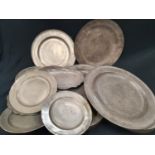 Large quantity of pewter plates.
