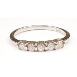 A 10ct white gold five stone diamond ring, Size N.