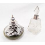 Two silver topped scent bottles.