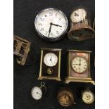 A box of clocks and mechanisms.