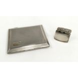 Silver cigarette case and lighter.