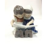 Royal Copenhagen figurine - two children with book.