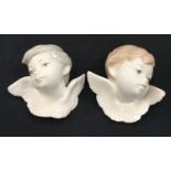 Lladro cherub heads.