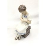 Danish B&G (Bing & Grondahl) figurine number 1656 - child knitting.