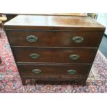 An Edwardian mahogany three drawer bedroom chest on bracket feet. Brass handles to front. H:88 W: