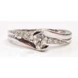 Diamond solitaire approx 0.25ct with diamond shoulders set in 9ct white gold ring. Size L.